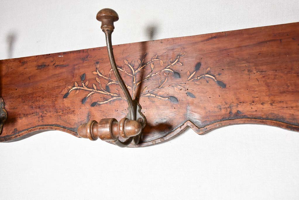 Salvaged 19th Century coat rack with olive tree marquetry 44"