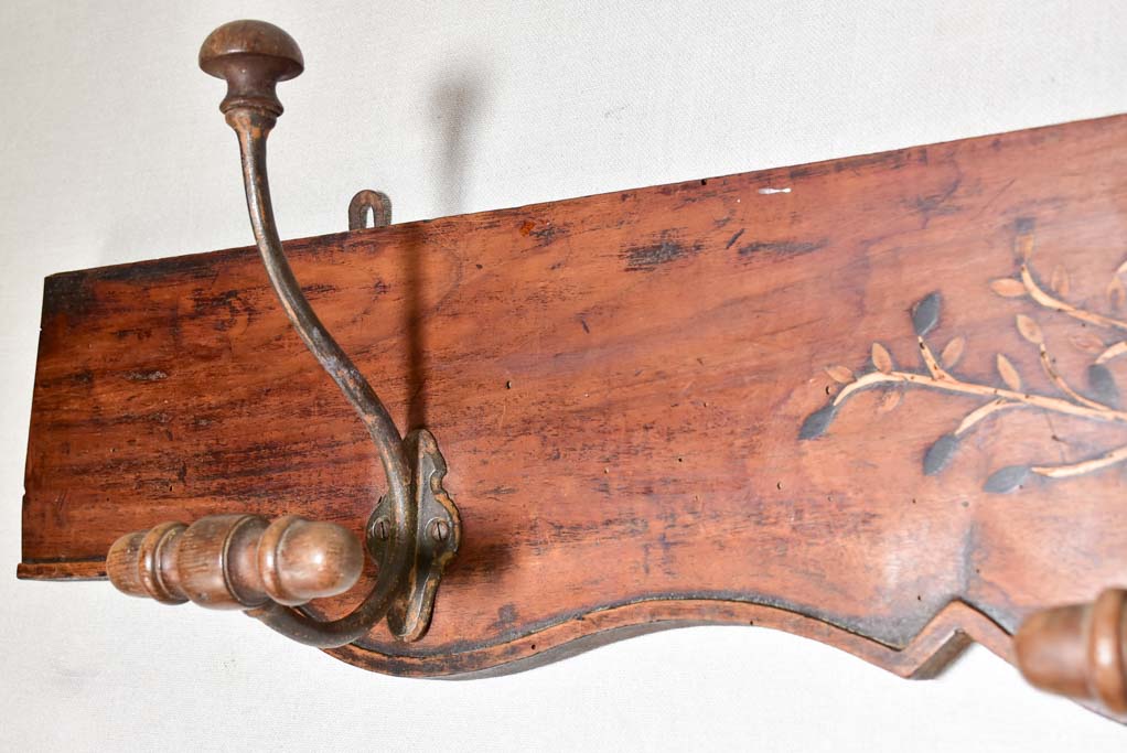 Salvaged 19th Century coat rack with olive tree marquetry 44"