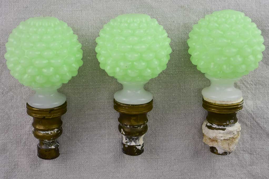 Three 18th century milk glass balustrade balls