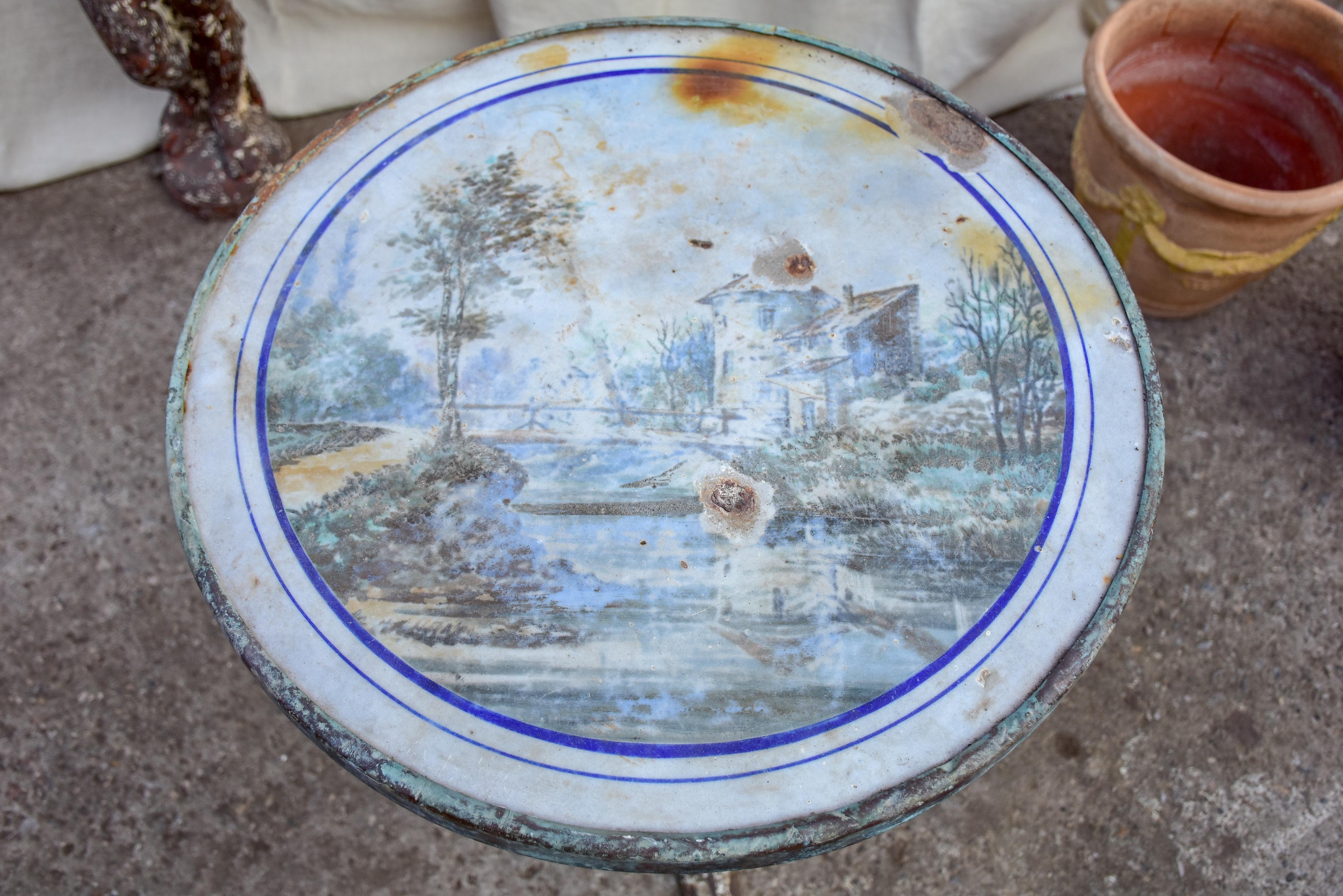 Antique French bistro table with decorative top