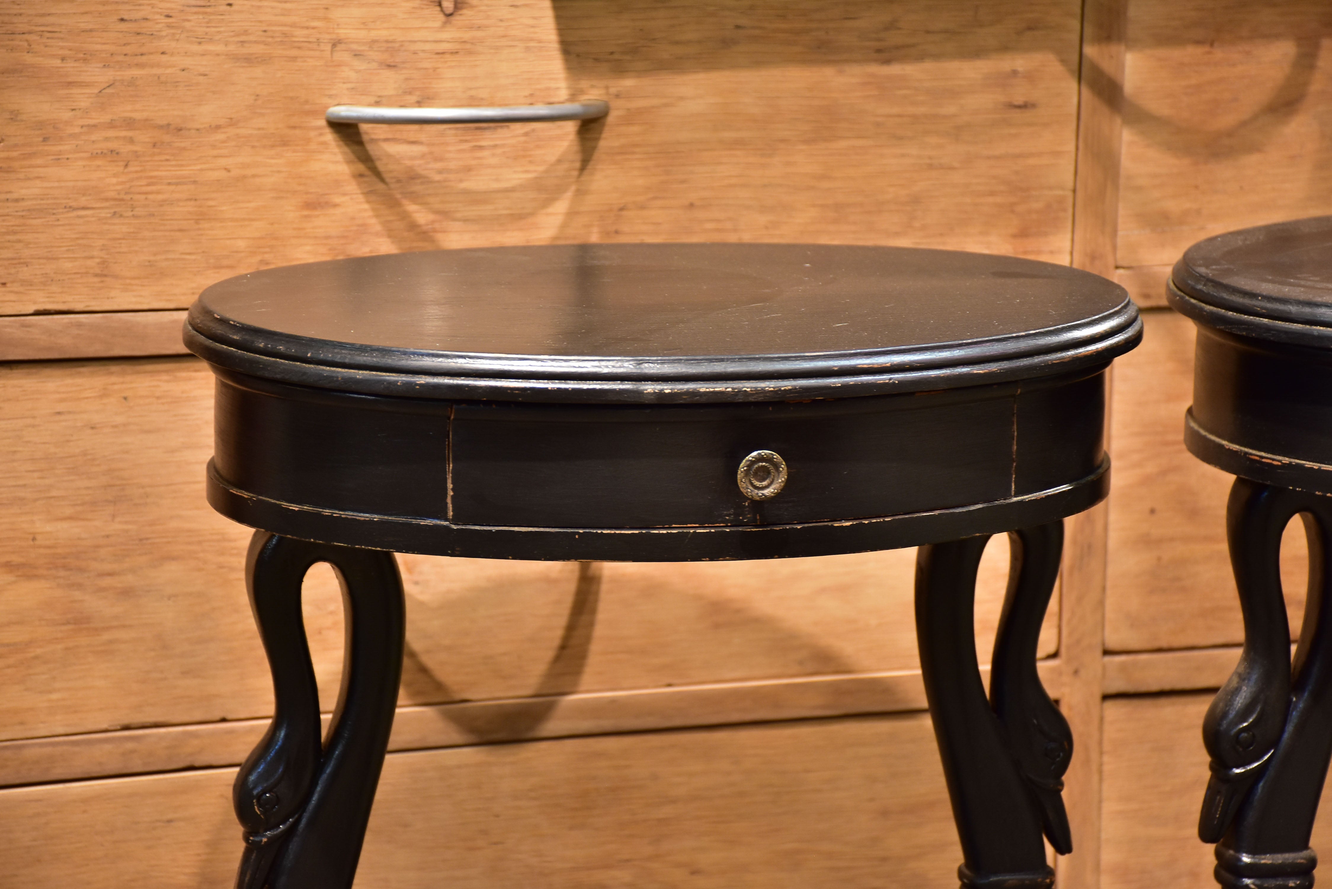 Pair of vintage French oval nightstands with black finish