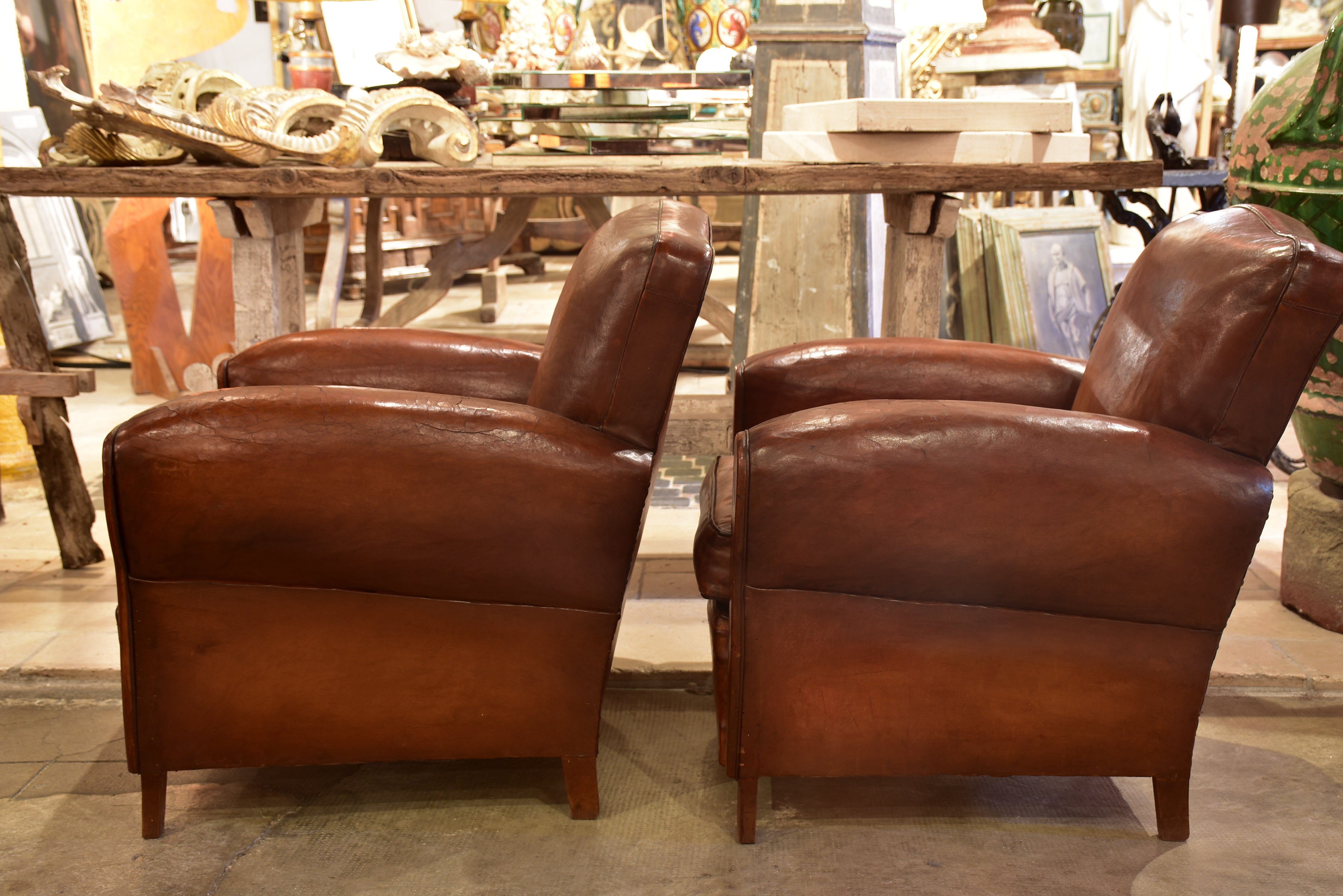 Pair of 1950's vintage club chairs - chapeau gendarme back