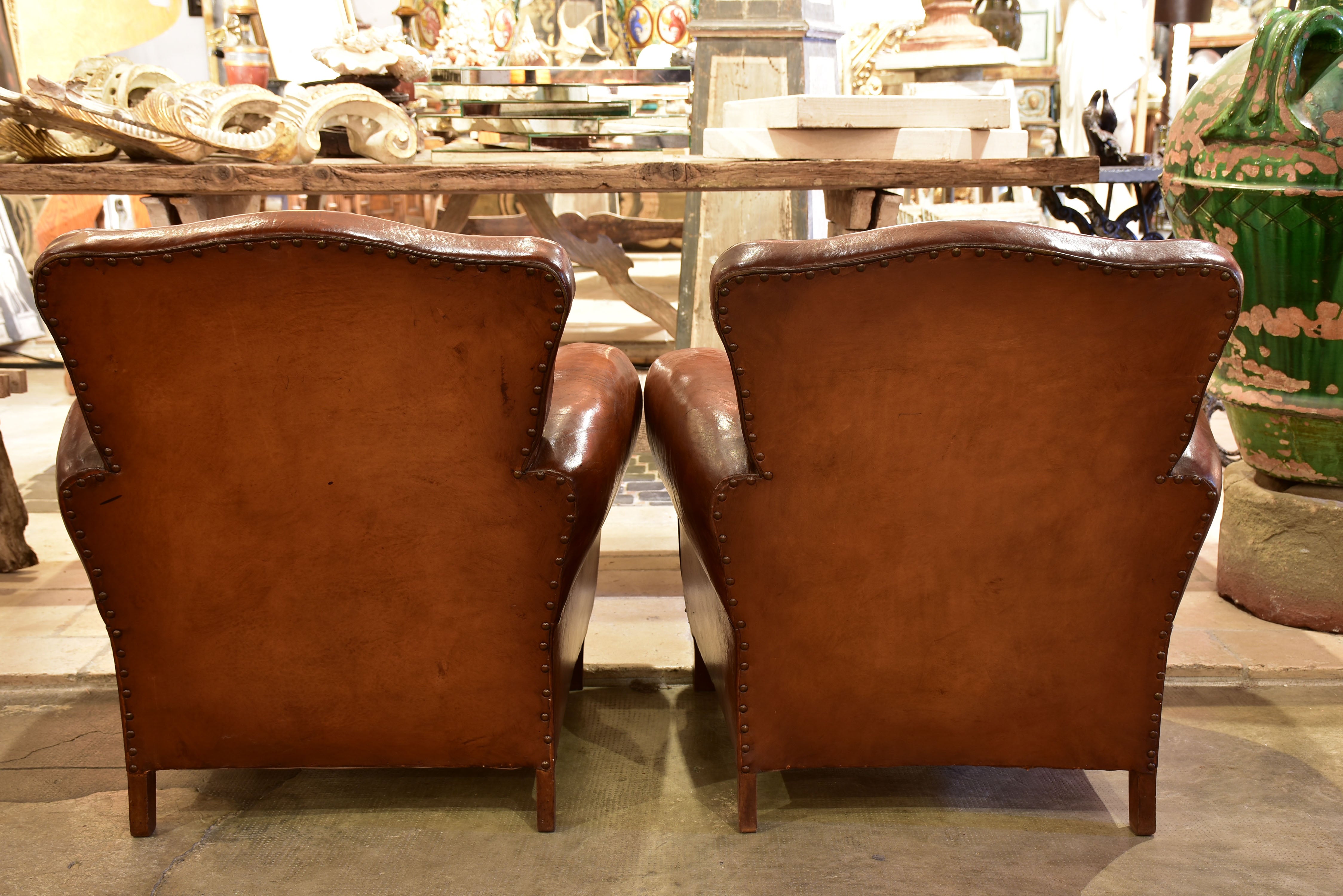 Pair of 1950's vintage club chairs - chapeau gendarme back