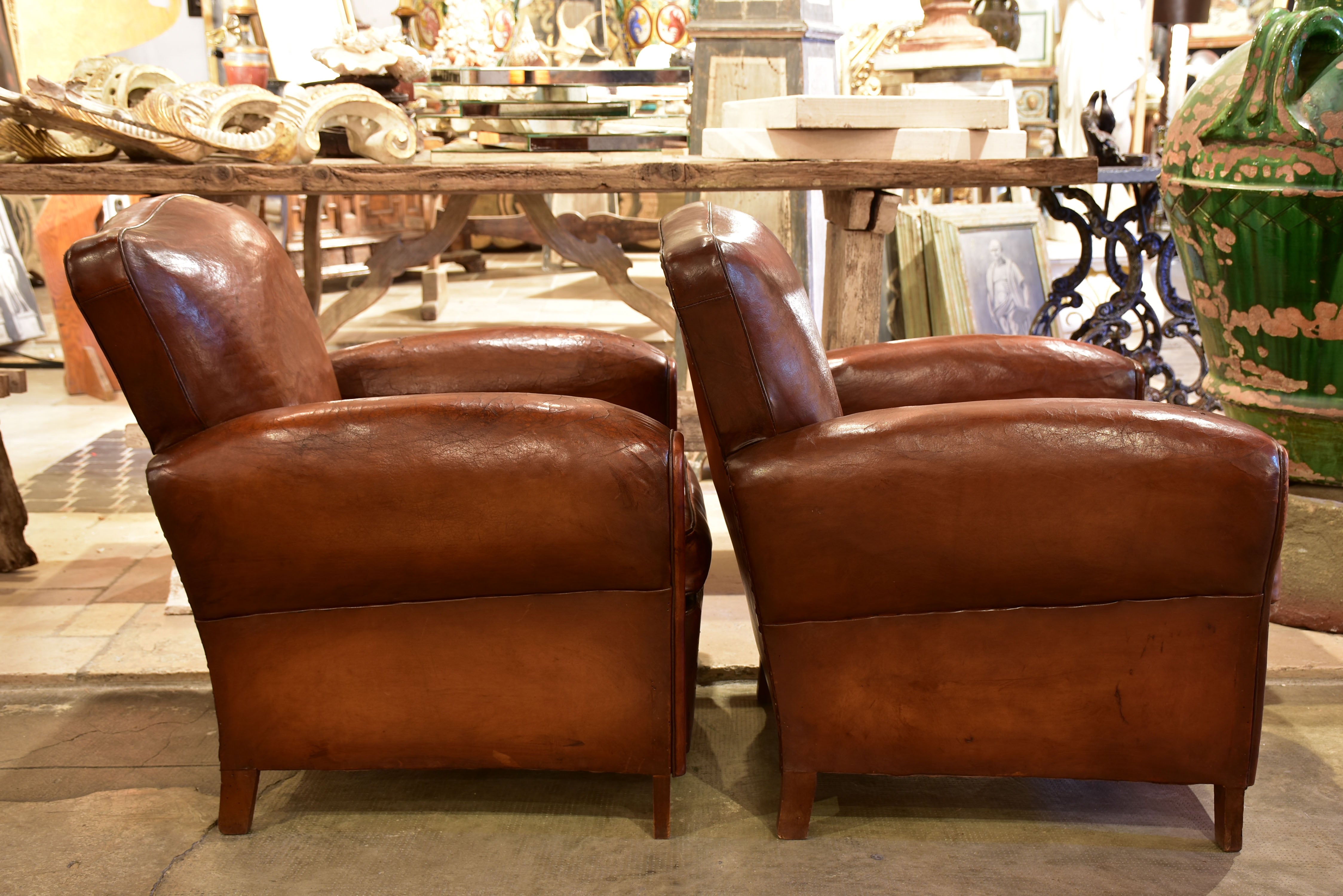 Pair of 1950's vintage club chairs - chapeau gendarme back