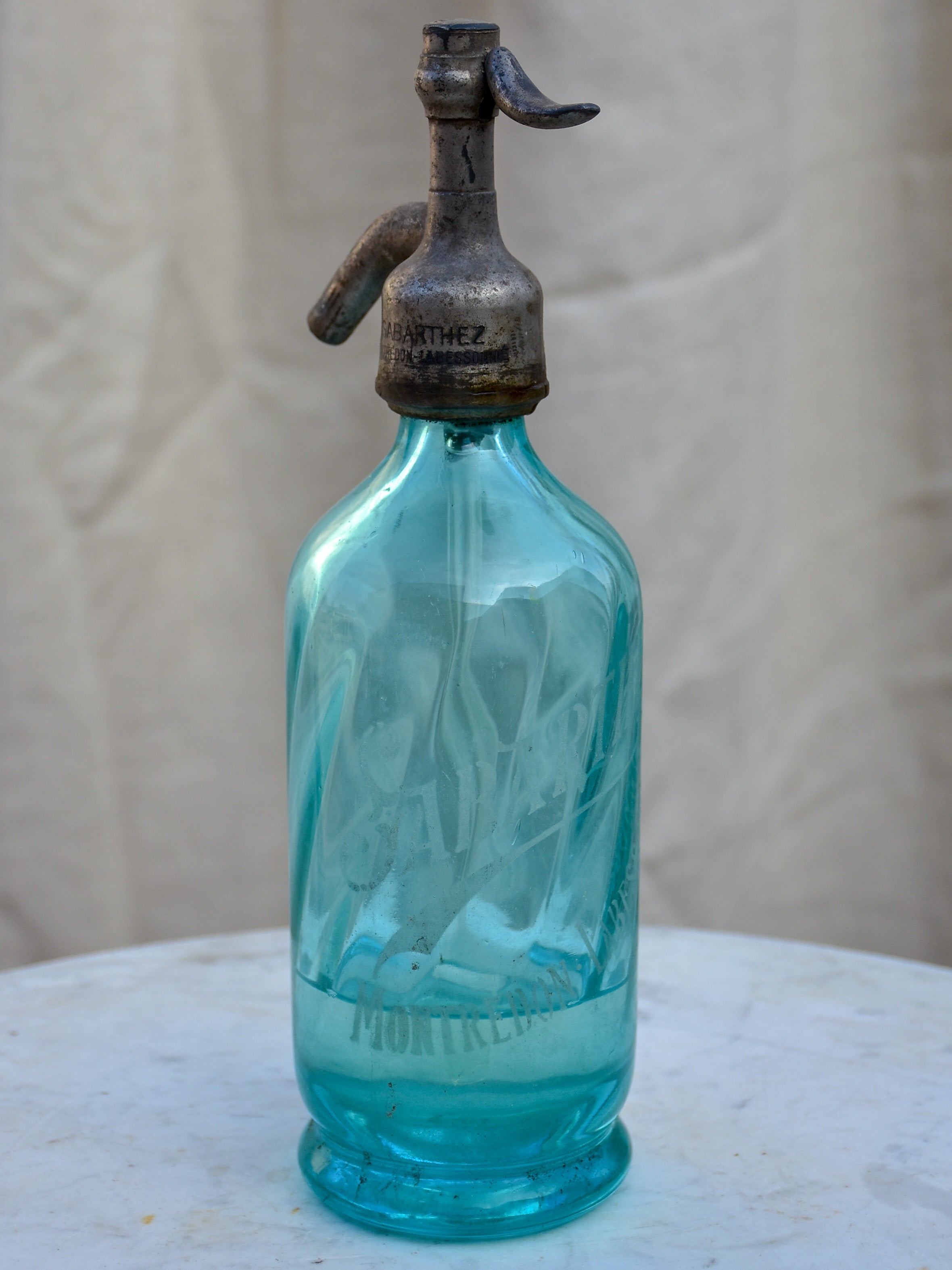 Collection of five antique French 'demi' seltzer bottles