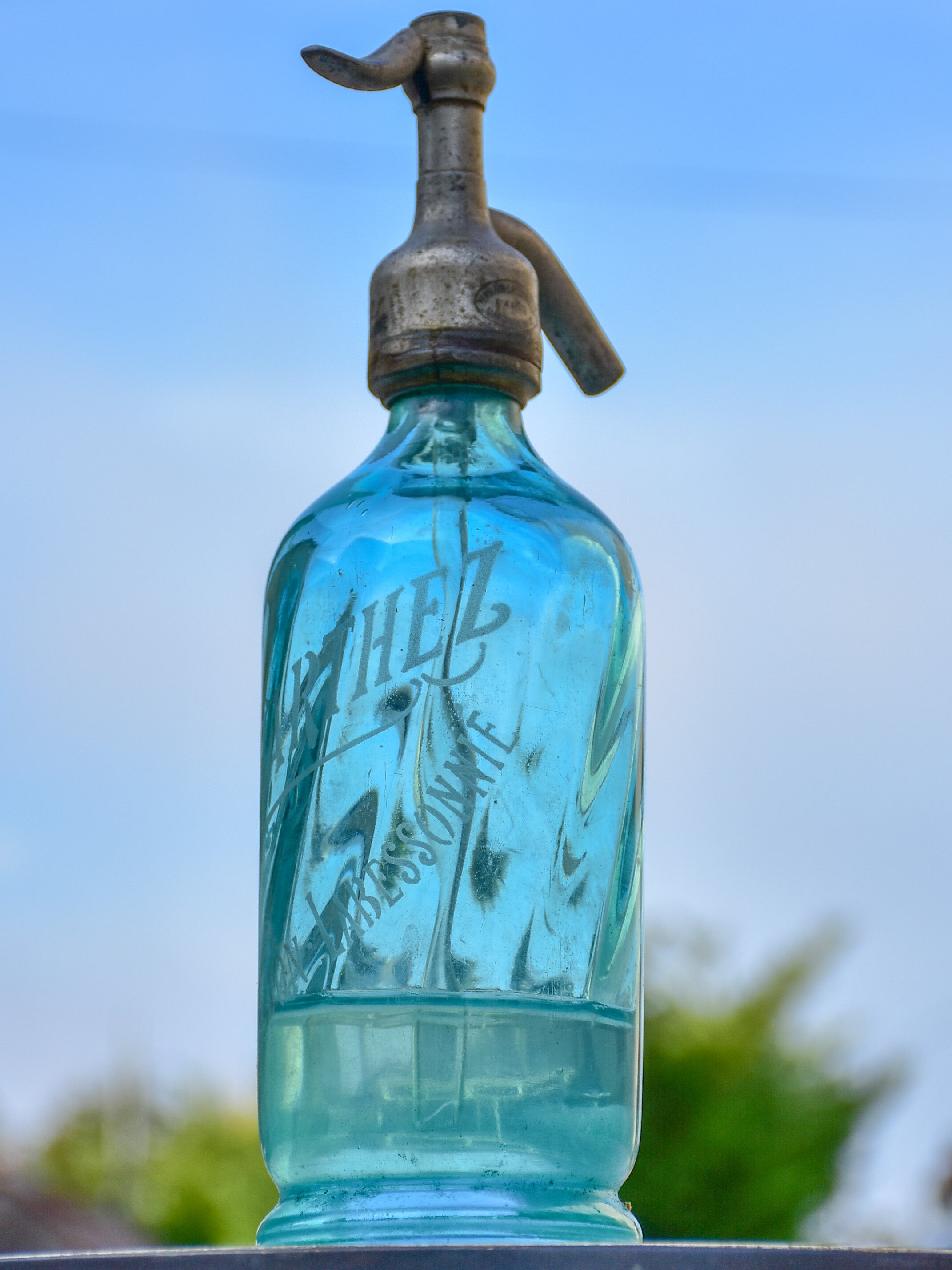 Collection of five antique French 'demi' seltzer bottles