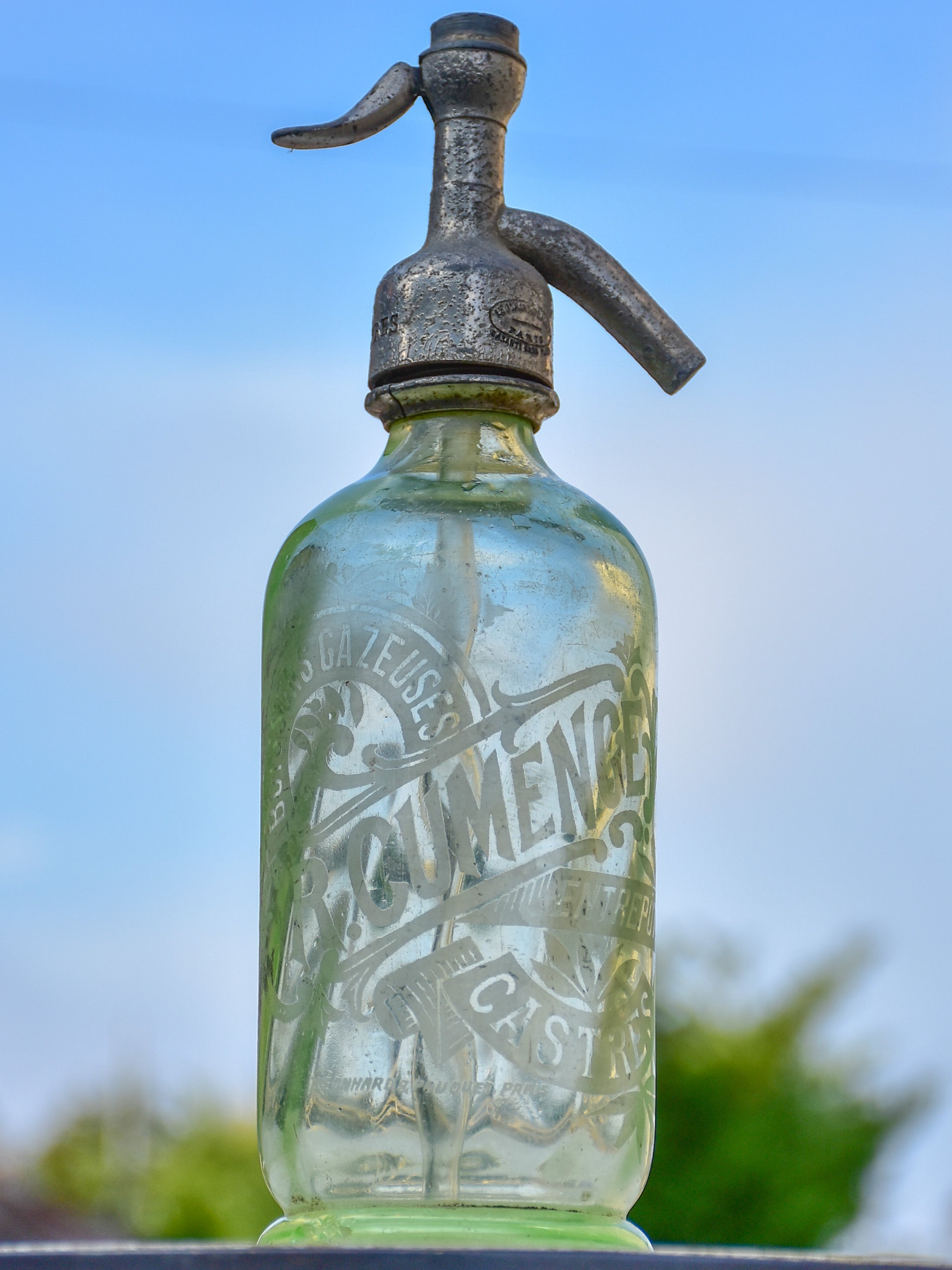 Collection of five antique French 'demi' seltzer bottles