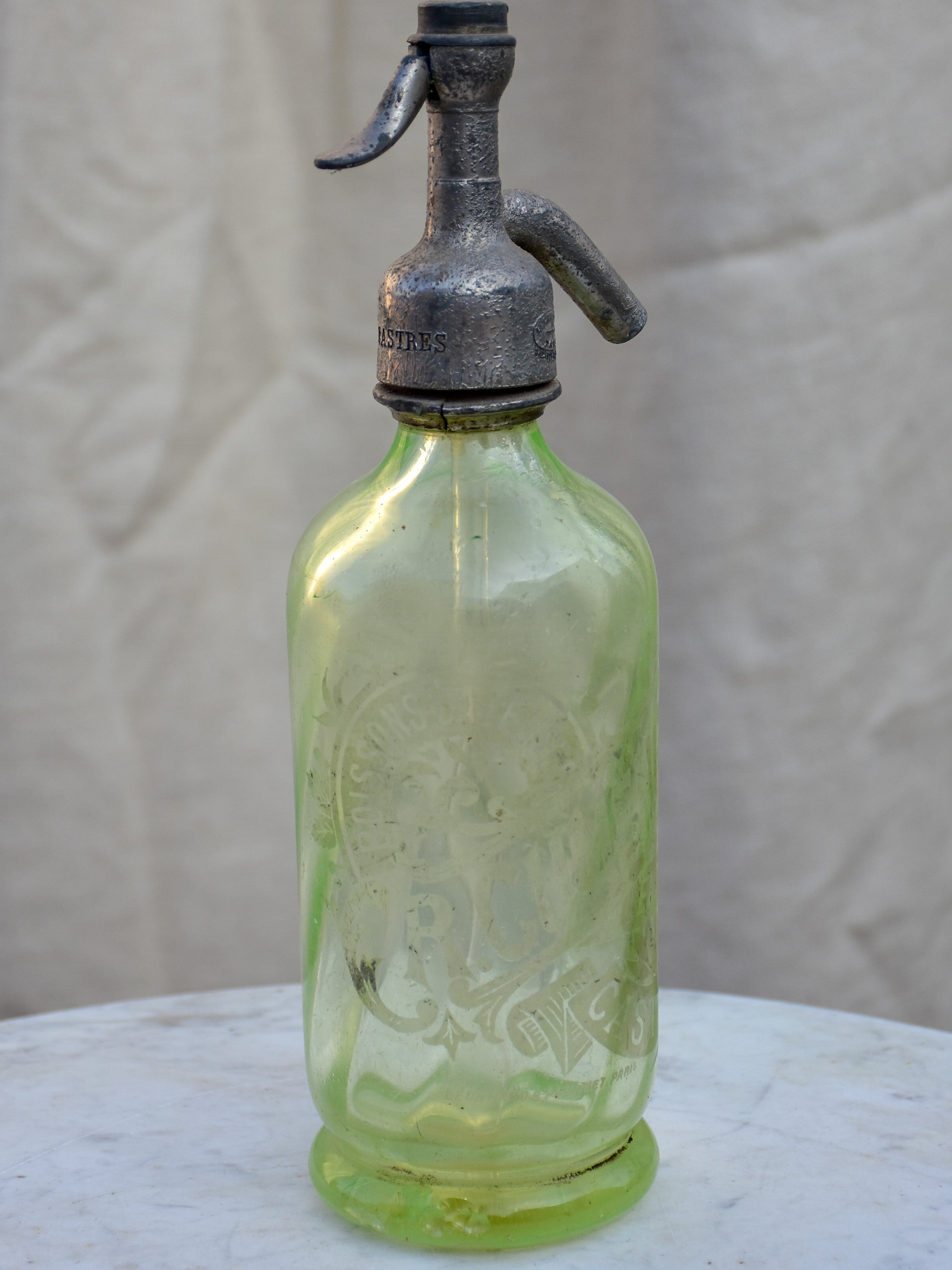 Collection of five antique French 'demi' seltzer bottles