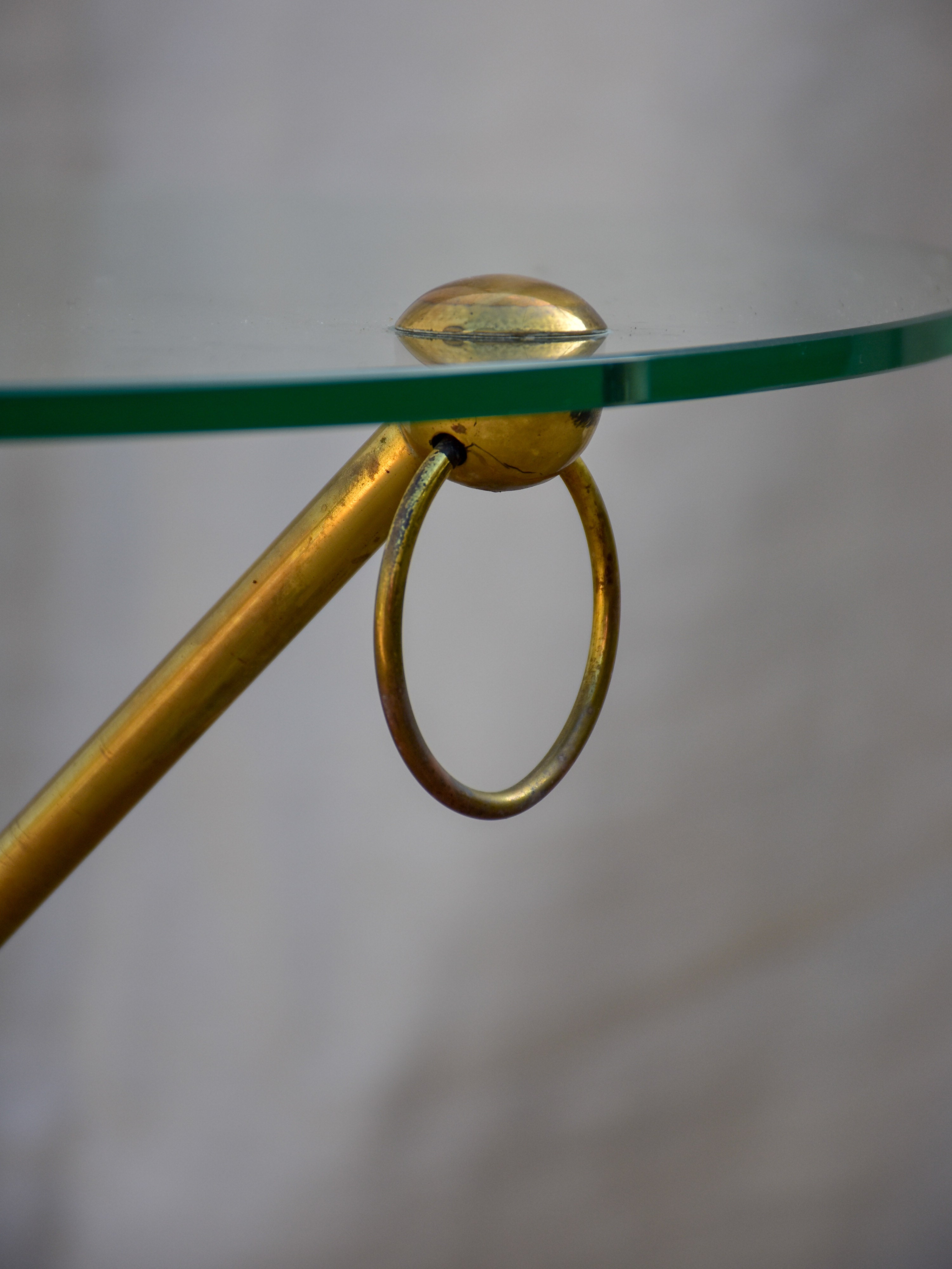 Vintage French coffee table with glass top and brass legs