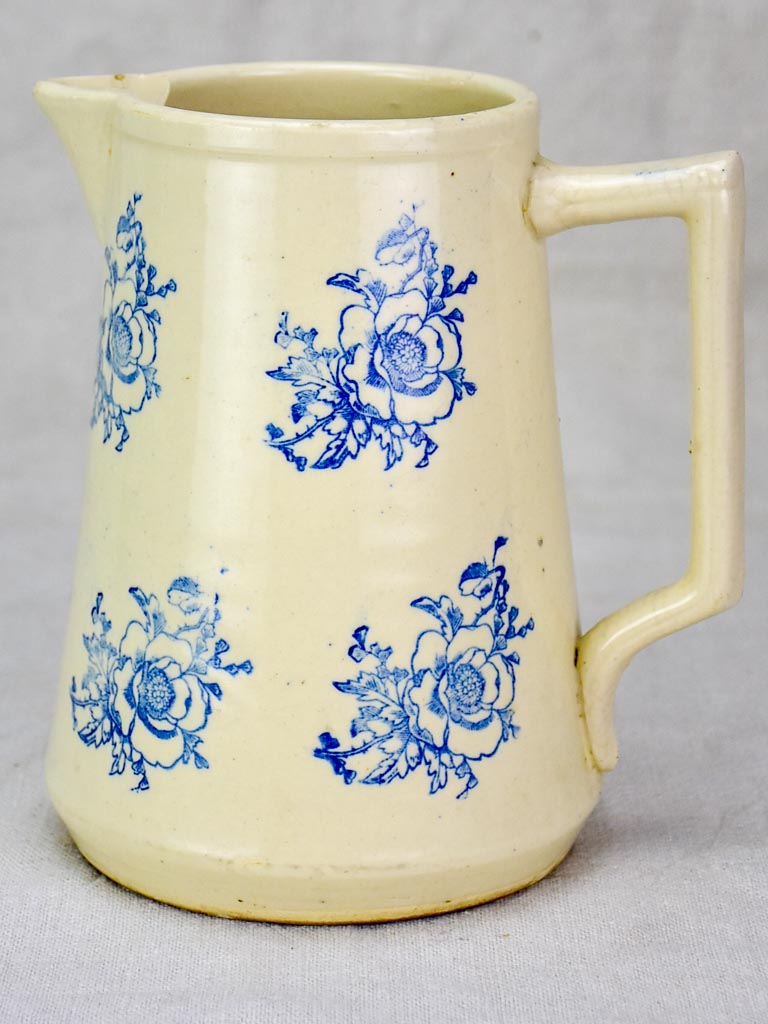 Antique Saint-Uze pitcher with blue flowers