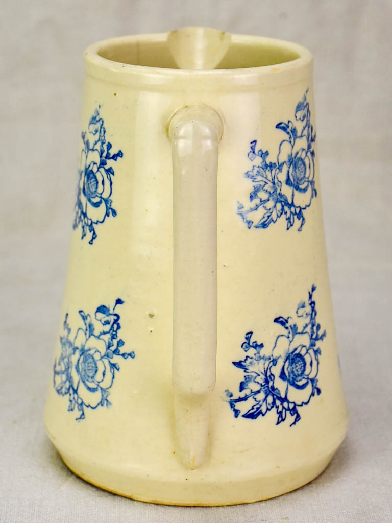 Antique Saint-Uze pitcher with blue flowers