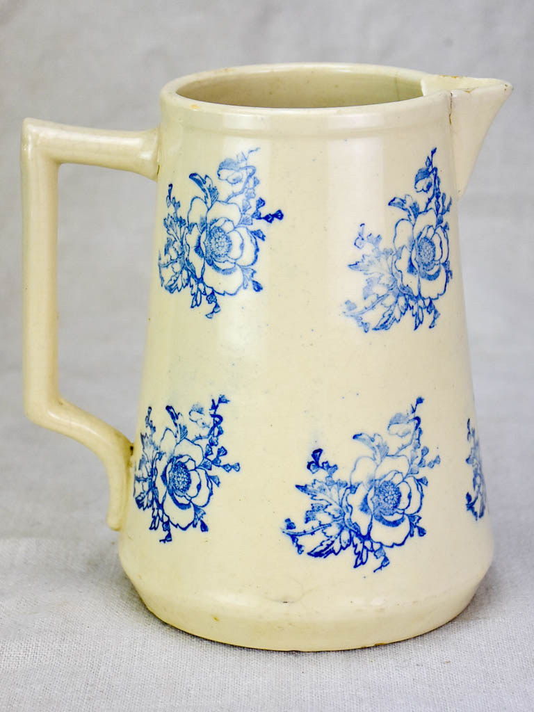 Antique Saint-Uze pitcher with blue flowers