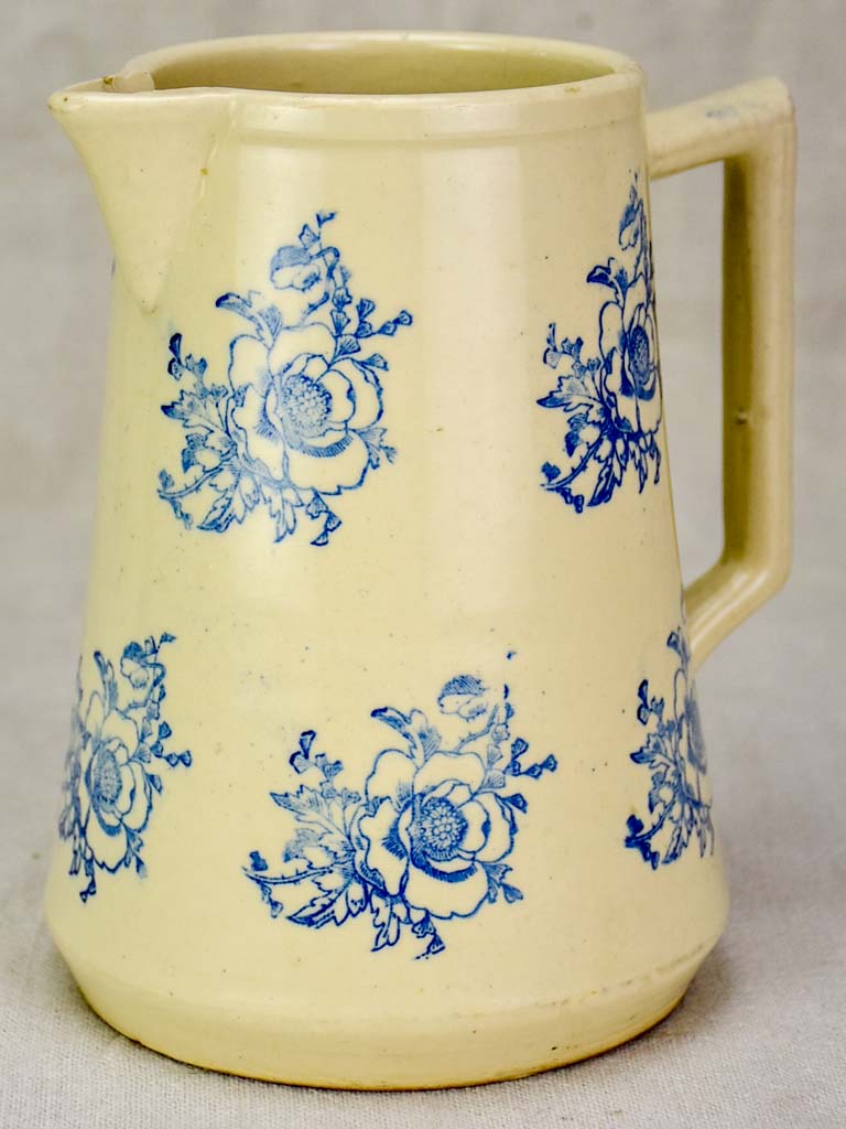 Antique Saint-Uze pitcher with blue flowers