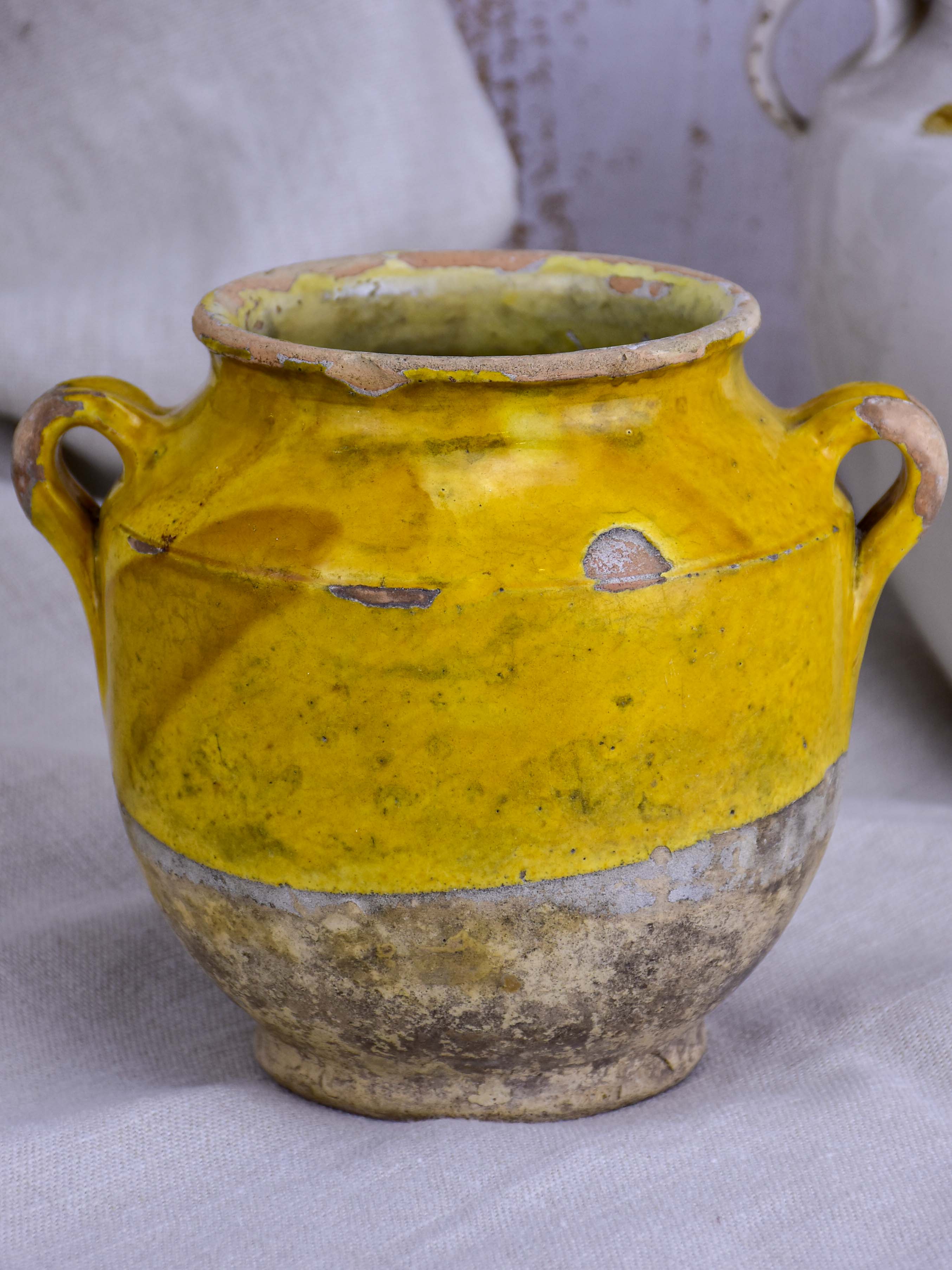 Small 19th Century French confit pot with orange glaze