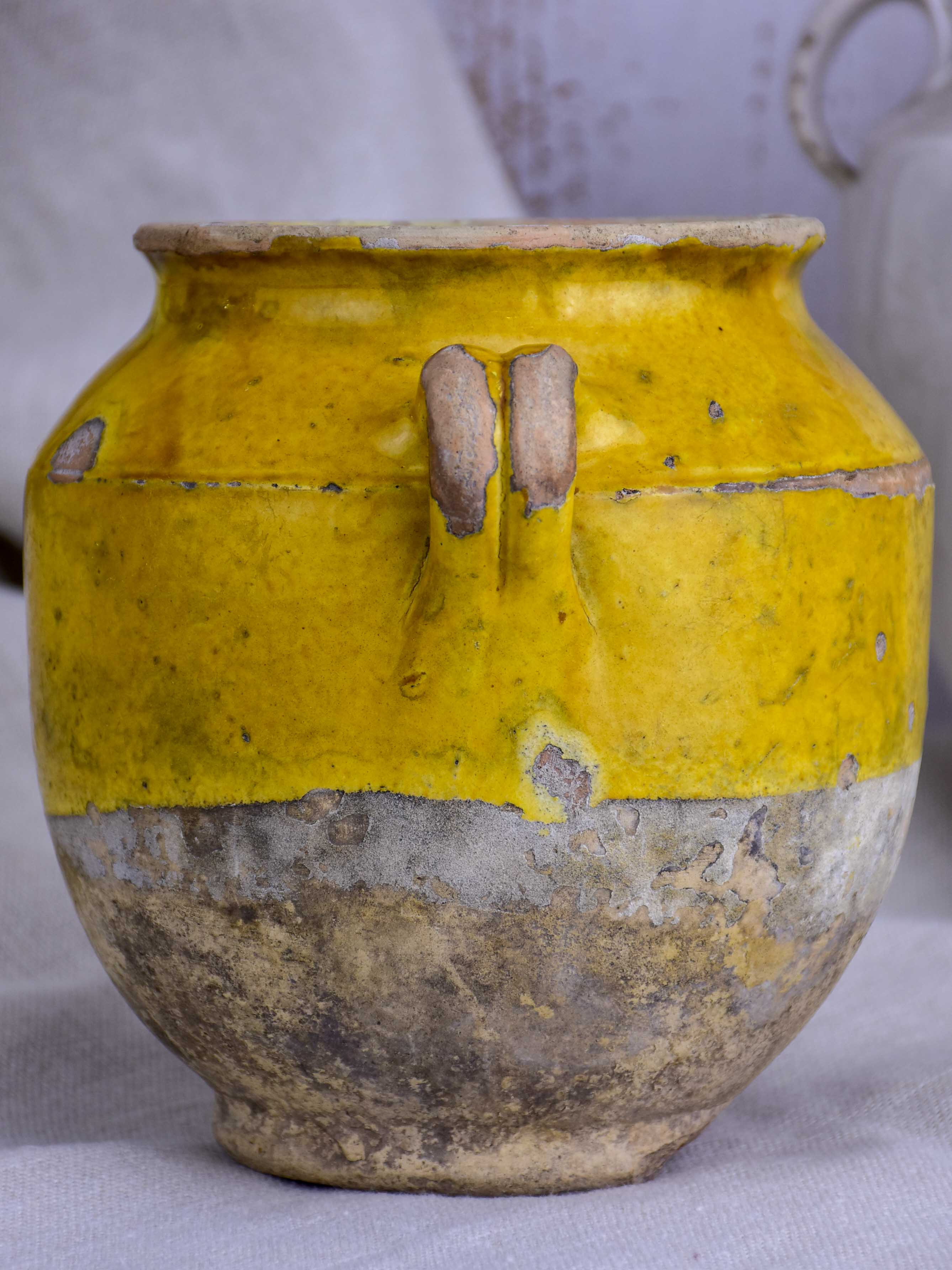 Small 19th Century French confit pot with orange glaze