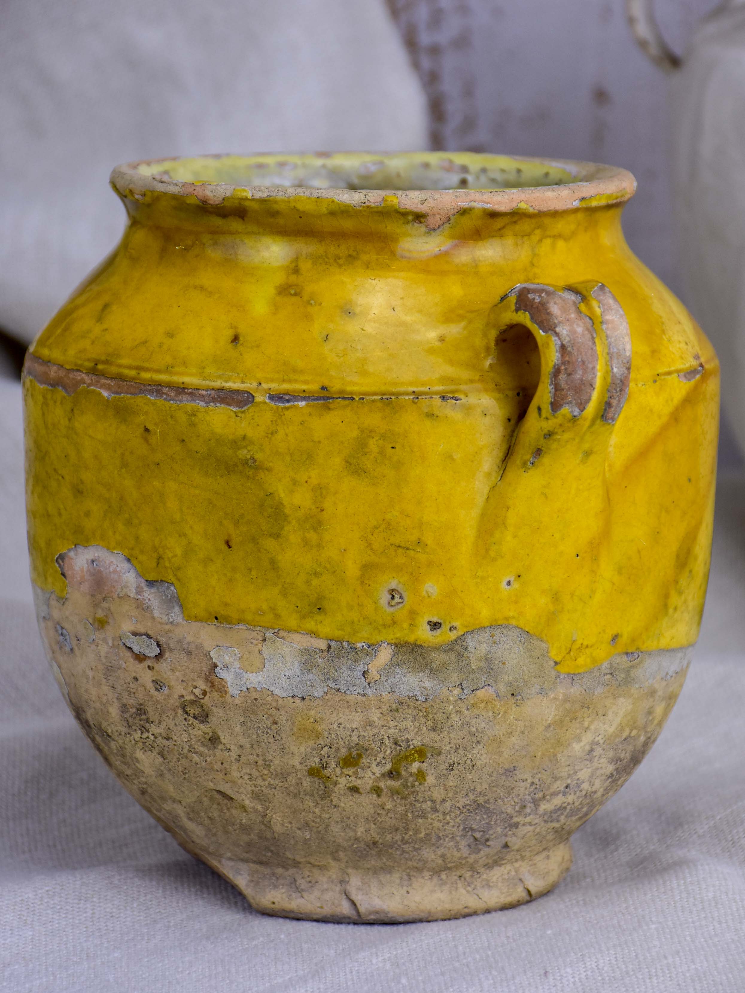 Small 19th Century French confit pot with orange glaze