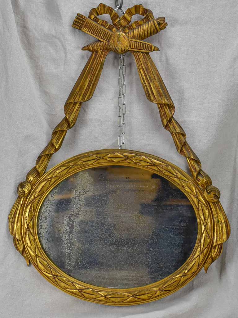 Pair of Louis XVI-style oval mirrors with carved wood frames 22" x 28¾"