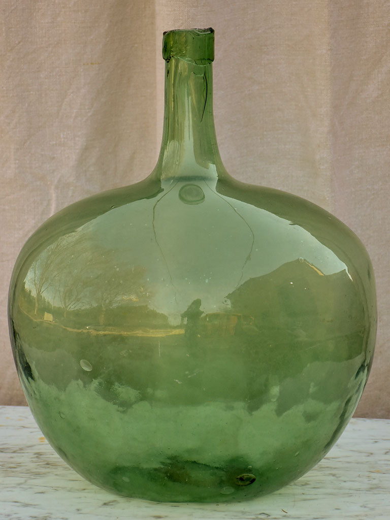 Two antique French demijohn bottles - oval blue green