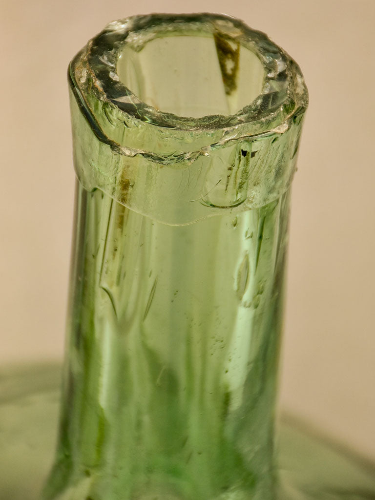 Two antique French demijohn bottles - oval blue green