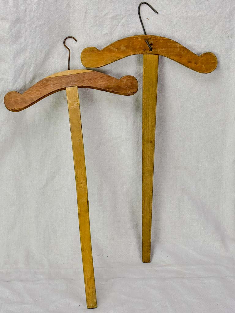 Two antique French coat hangers