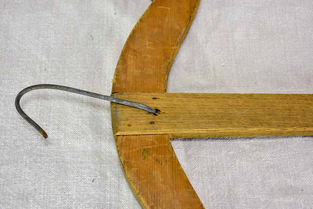 Two antique French coat hangers