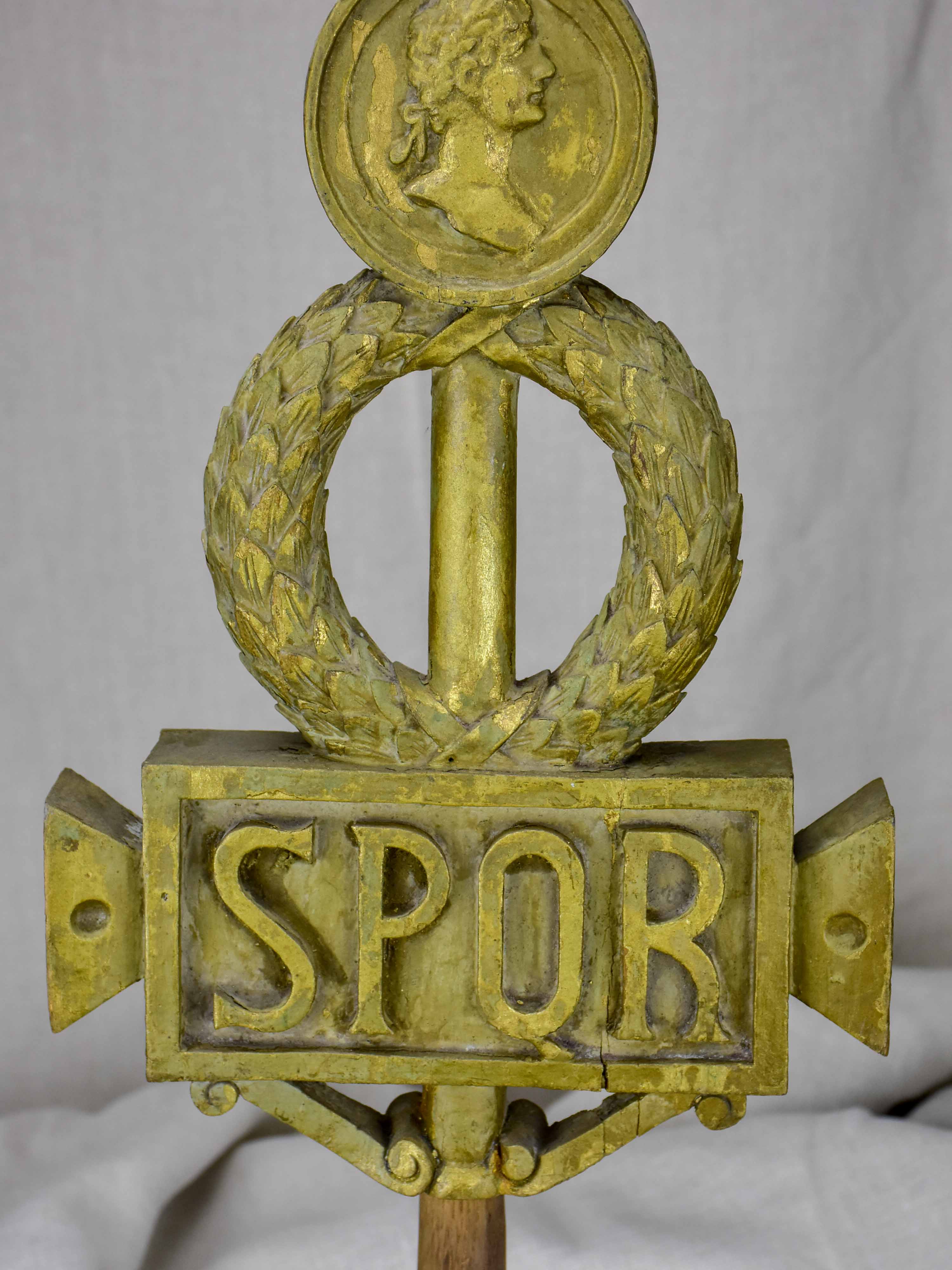 SPQR Roman emblem mounted on wooden base