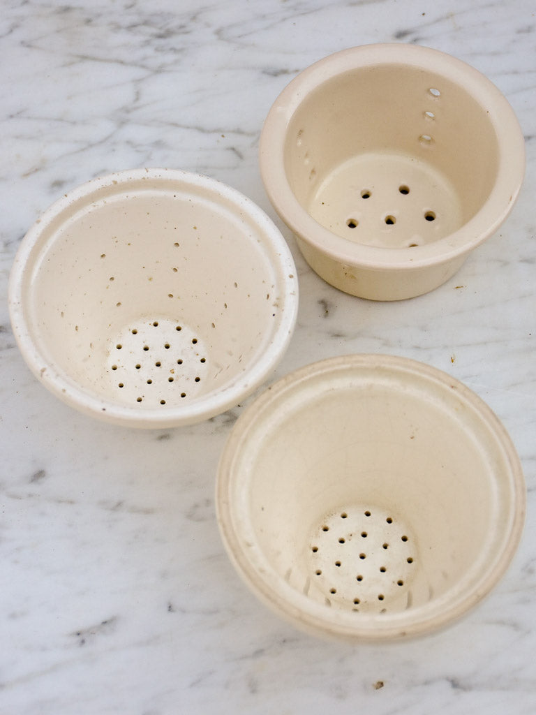 Three white miniature French faience cheese molds