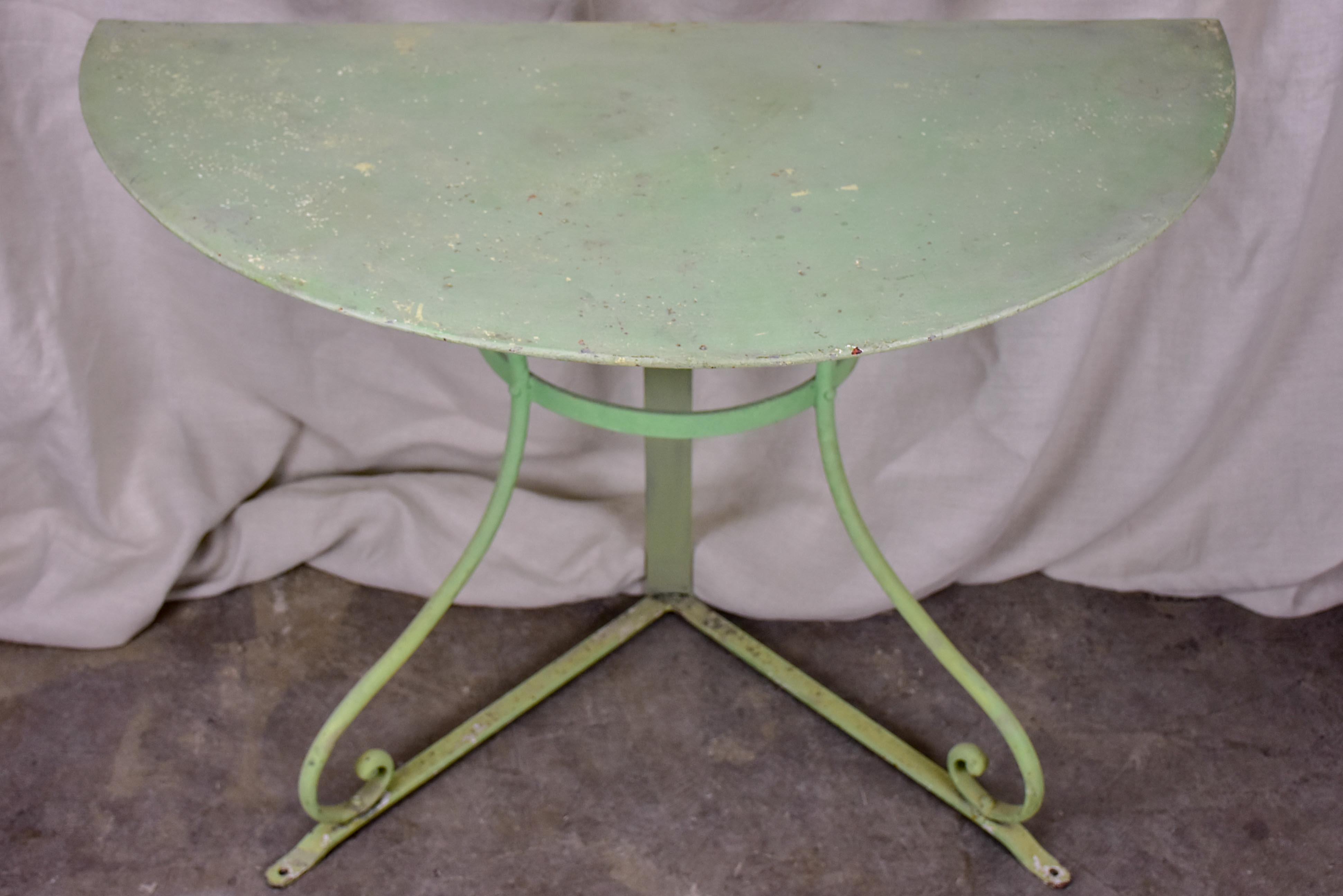 Pair of antique French half-moon garden tables