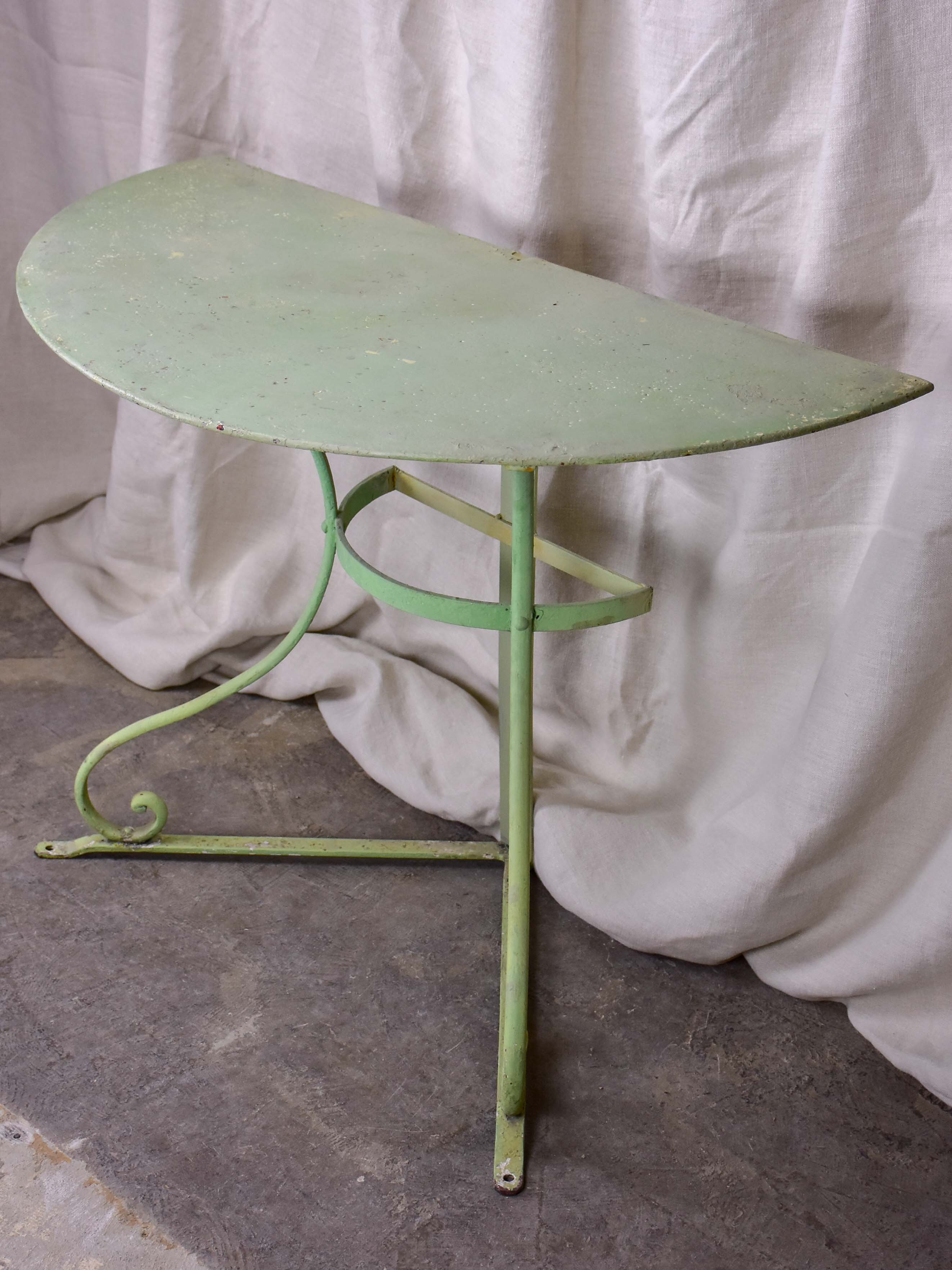 Pair of antique French half-moon garden tables