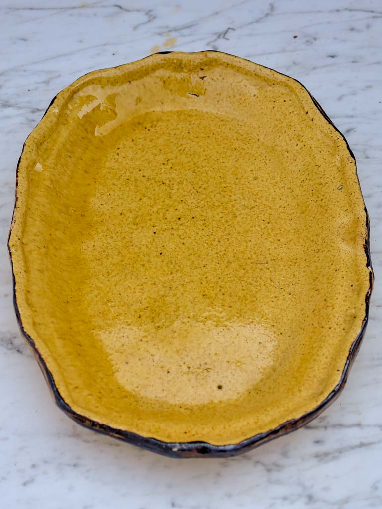 Antique French oval Dieulefit plate - yellow with 'burnt' edge