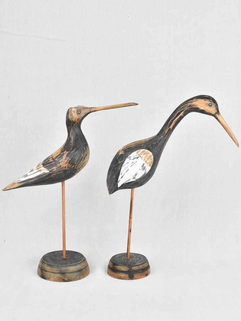 Two vintage wooden sculptures of ibis birds 17"