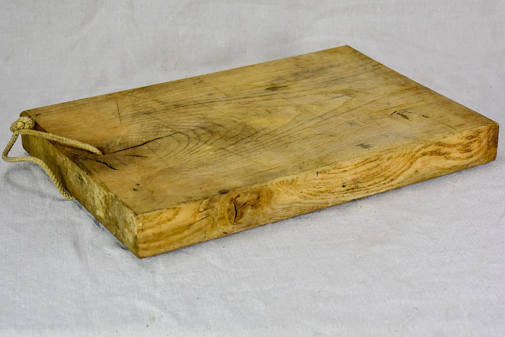 Antique French cutting board with rope handle 13¾" x  17¾"