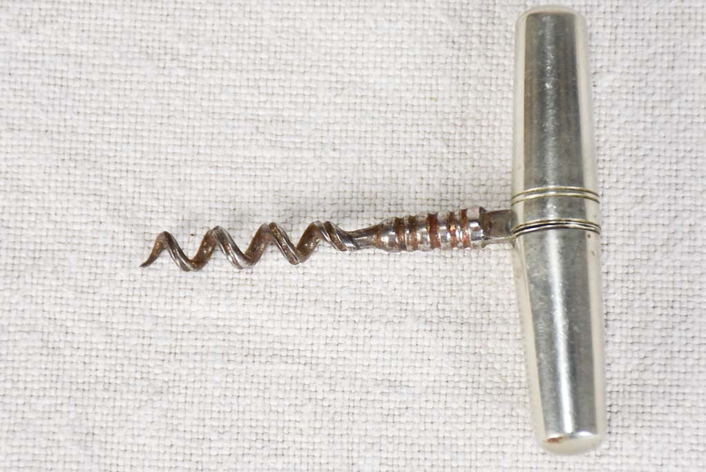 Early 20th-century capsule-shaped bottle opener