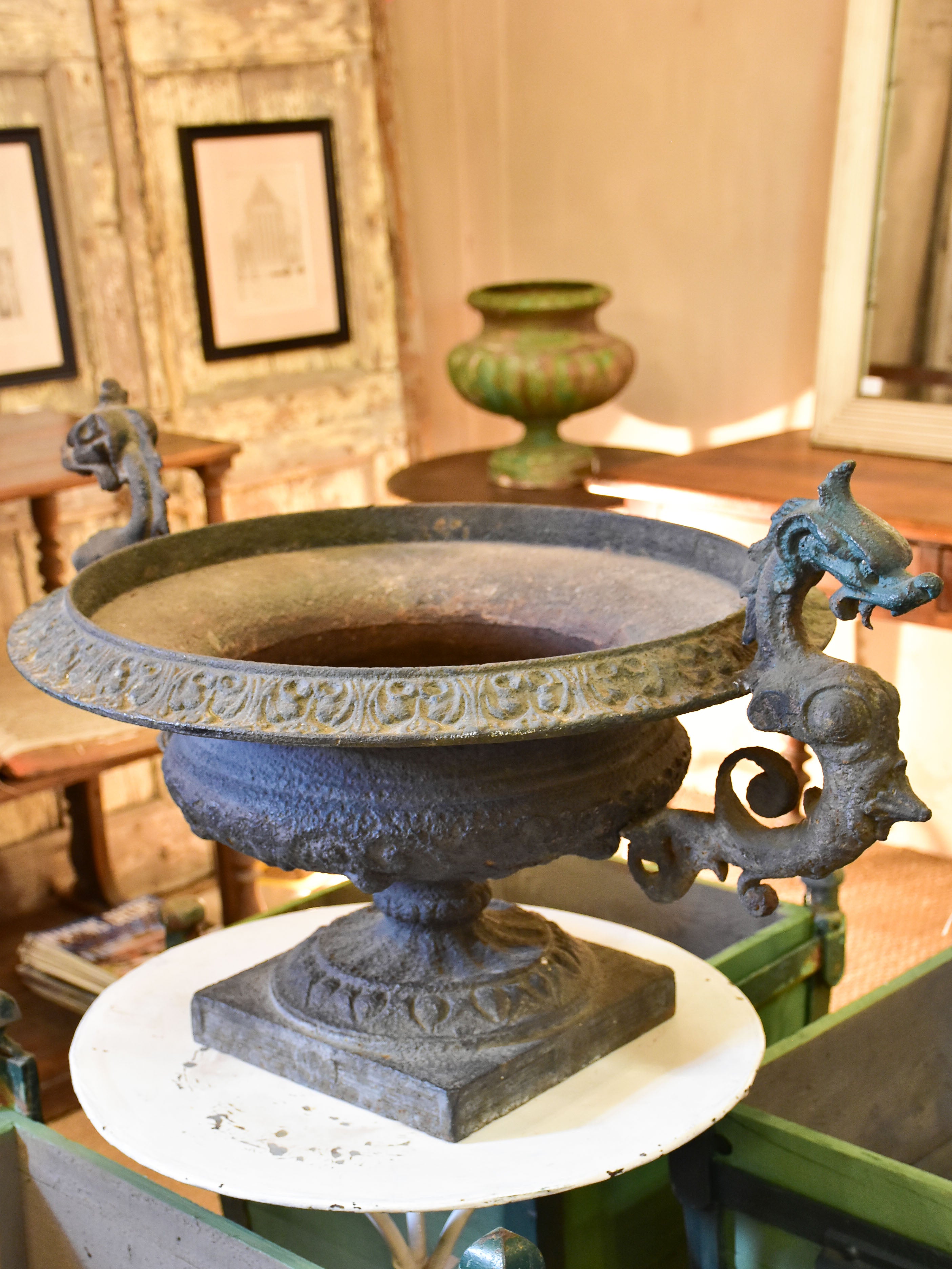 A large dragon-head Medici urn in cast iron