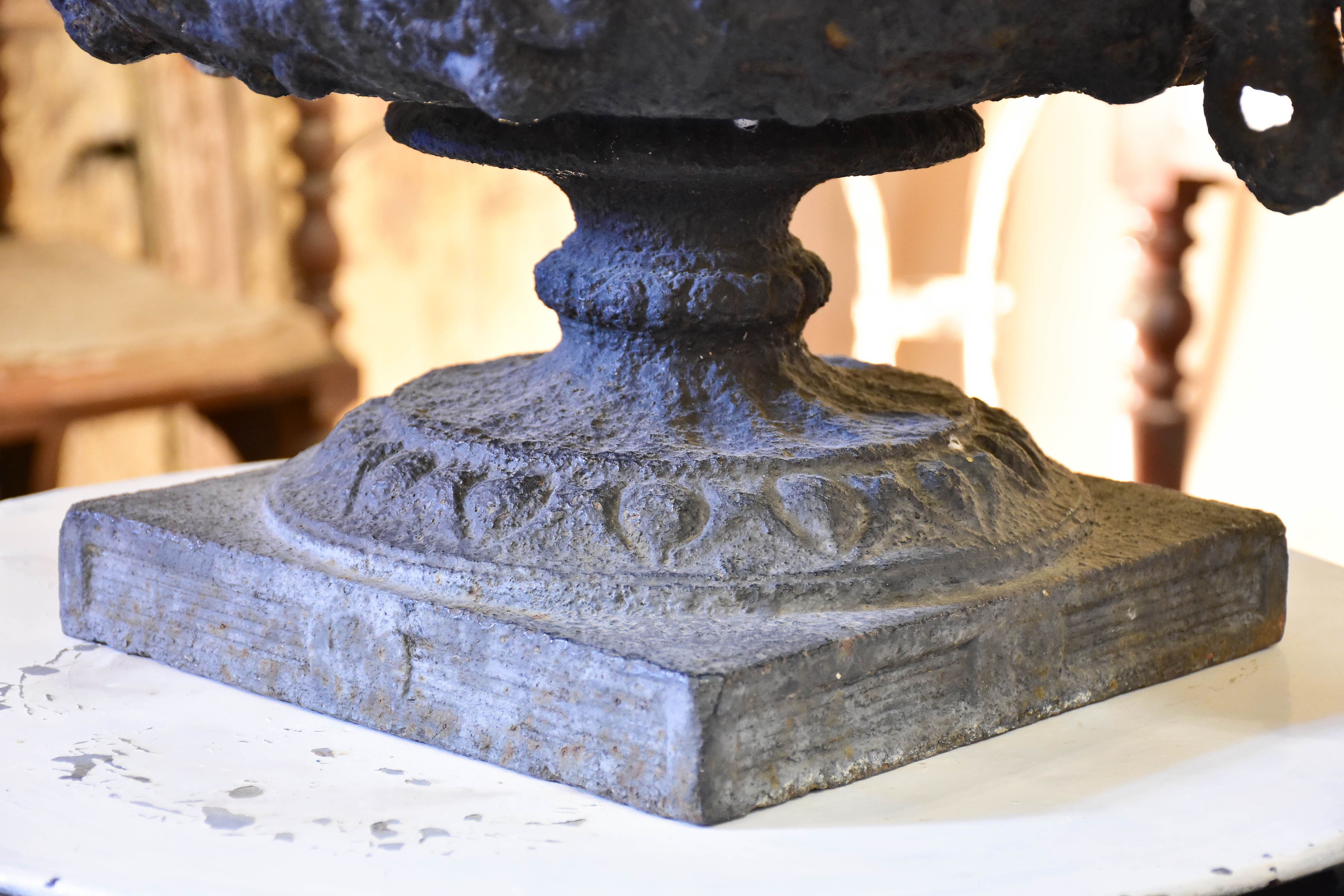 A large dragon-head Medici urn in cast iron