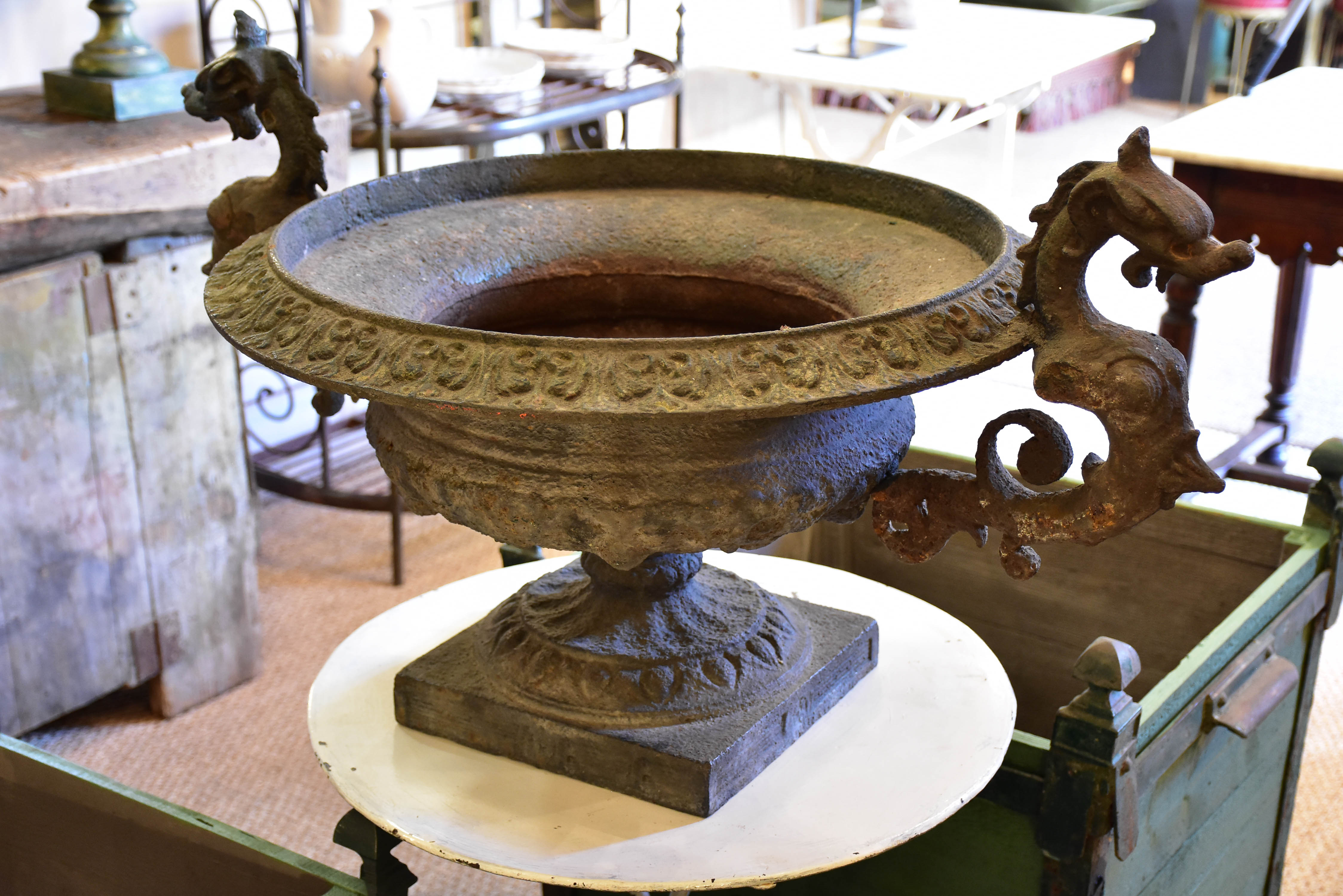 A large dragon-head Medici urn in cast iron