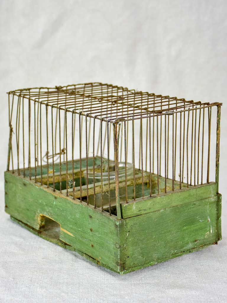 Early 20th century French birdcage with green patina