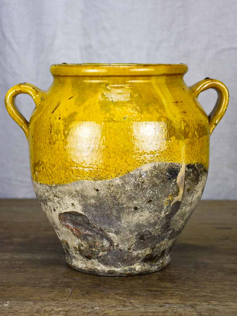 Timeworn antique French confit pot with yellow glaze 10¾"