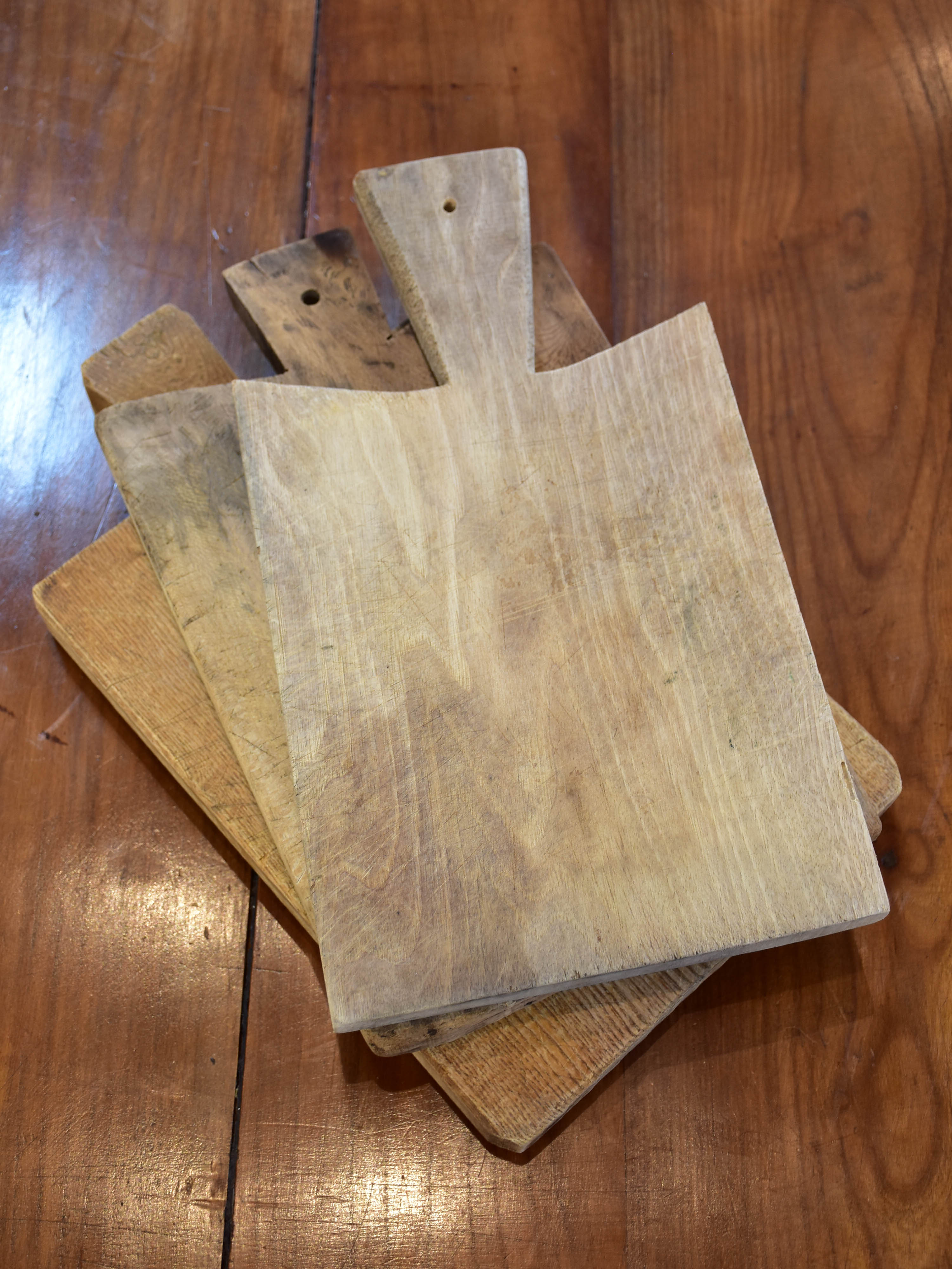 Three rustic French cutting boards