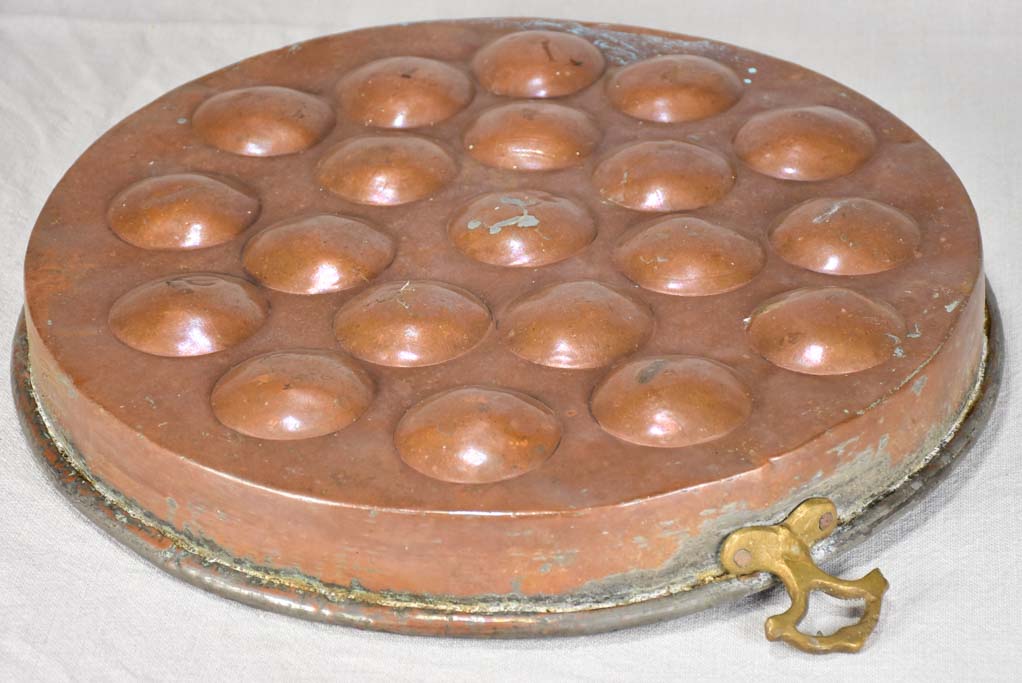 Elegant vintage copper egg poacher