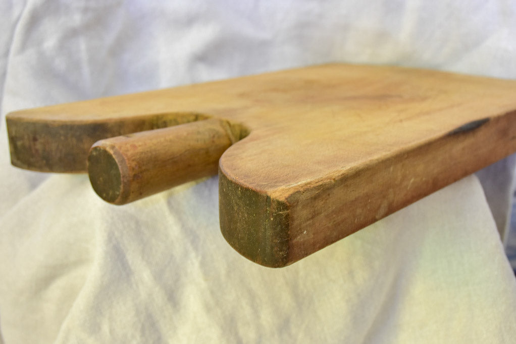 Antique French cutting board with rounded peak shoulders  17¾" x 11"