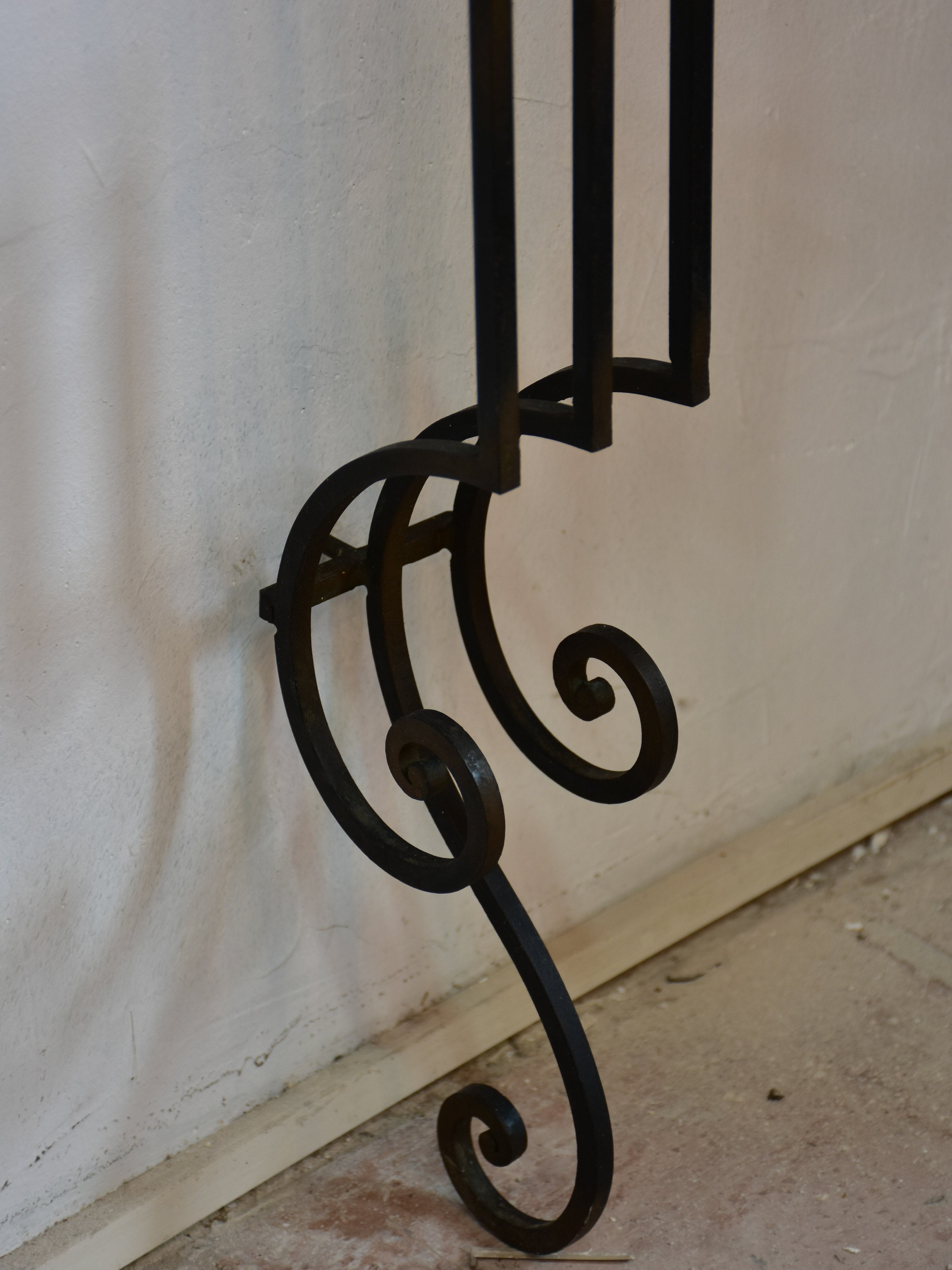 Small marble top console table with decorative wrought iron base