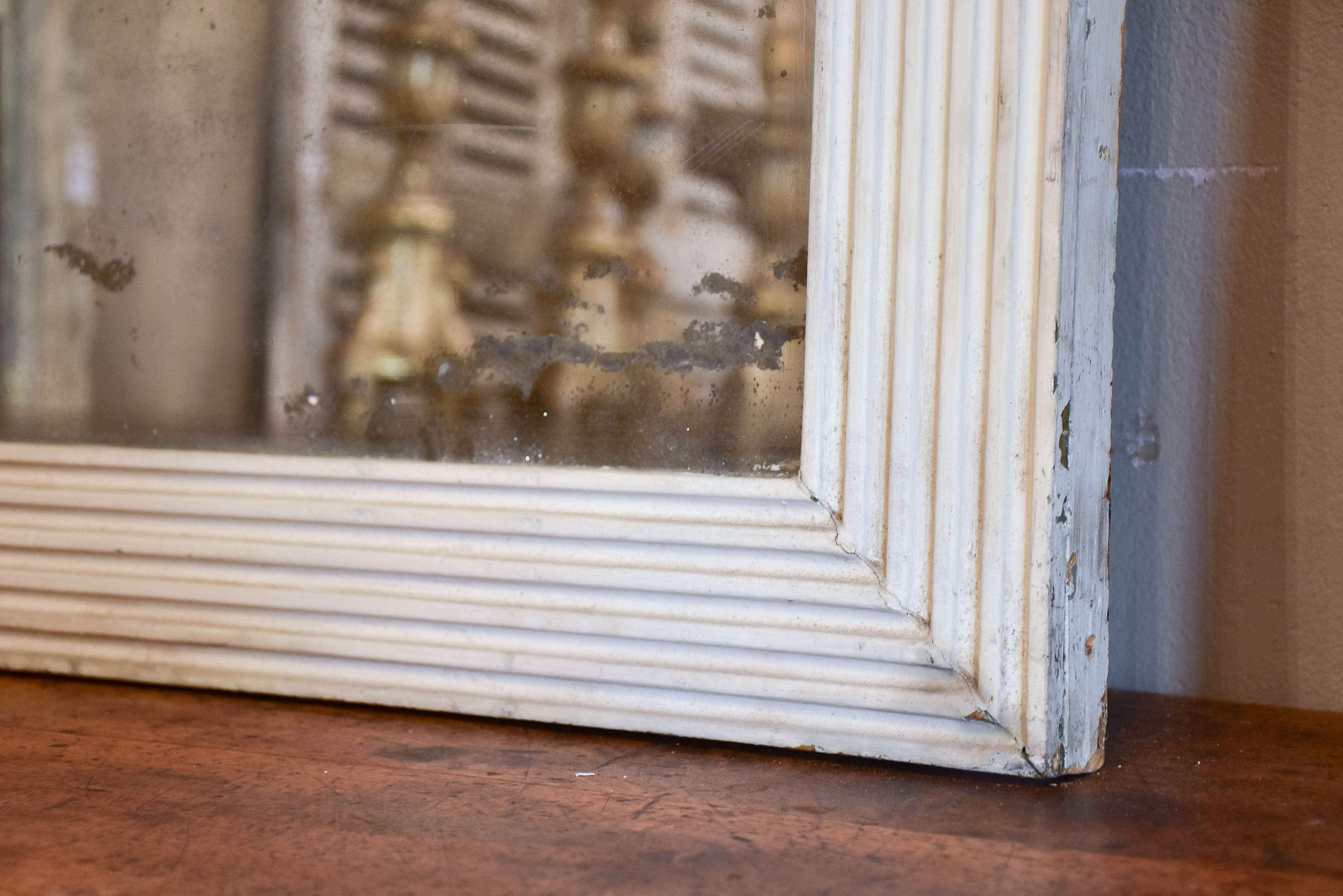 Large antique French mirror with painted white frame