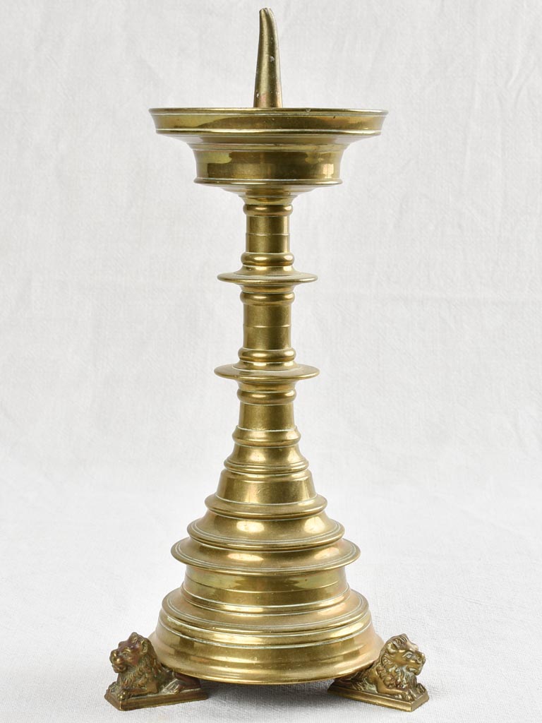 Old-style, bright, bronze candlestick 19th-century