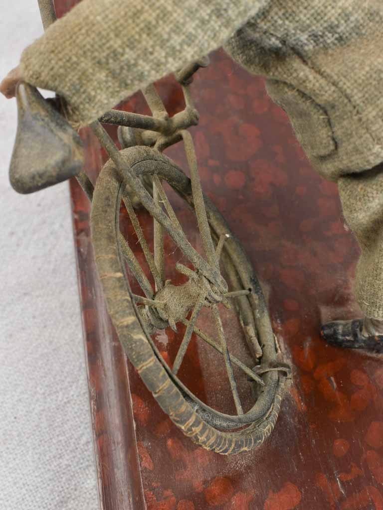 Detailed 1910's Cyclist Repair Sculpture