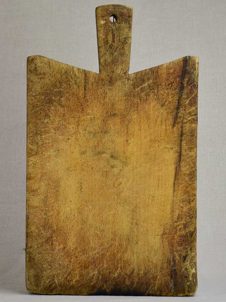 Small antique French cutting board with peaked shoulders 15¾" x 9½"