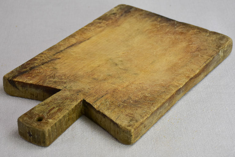 Small antique French cutting board with peaked shoulders 15¾" x 9½"