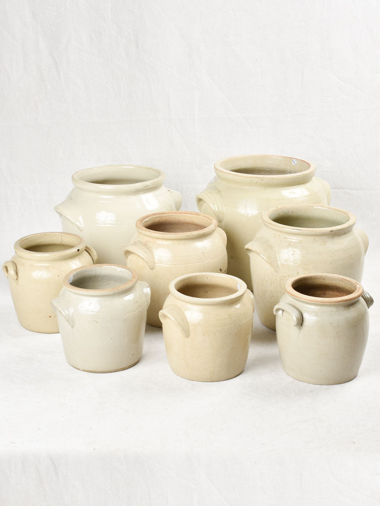 Collection of 8 antique stoneware crock pots 7½" - 12½"