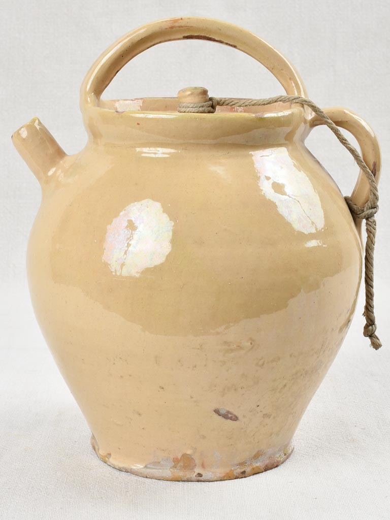 Pale yellow lidded water pitcher, 19th century 11½"