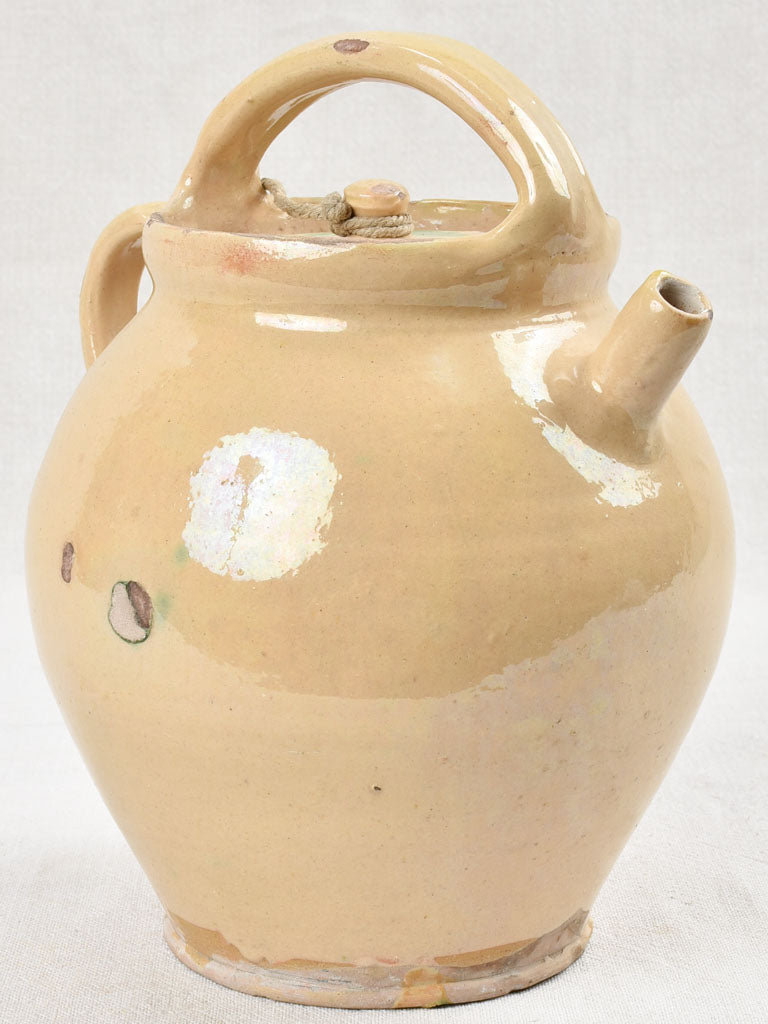 Pale yellow lidded water pitcher, 19th century 11½"